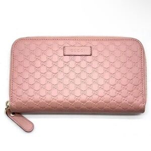 Gucci Microguccissima Embossed Round Zip Wallet